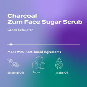 Indigo Wild Zum Face Sugar Scrub texture close-up showing charcoal grains.