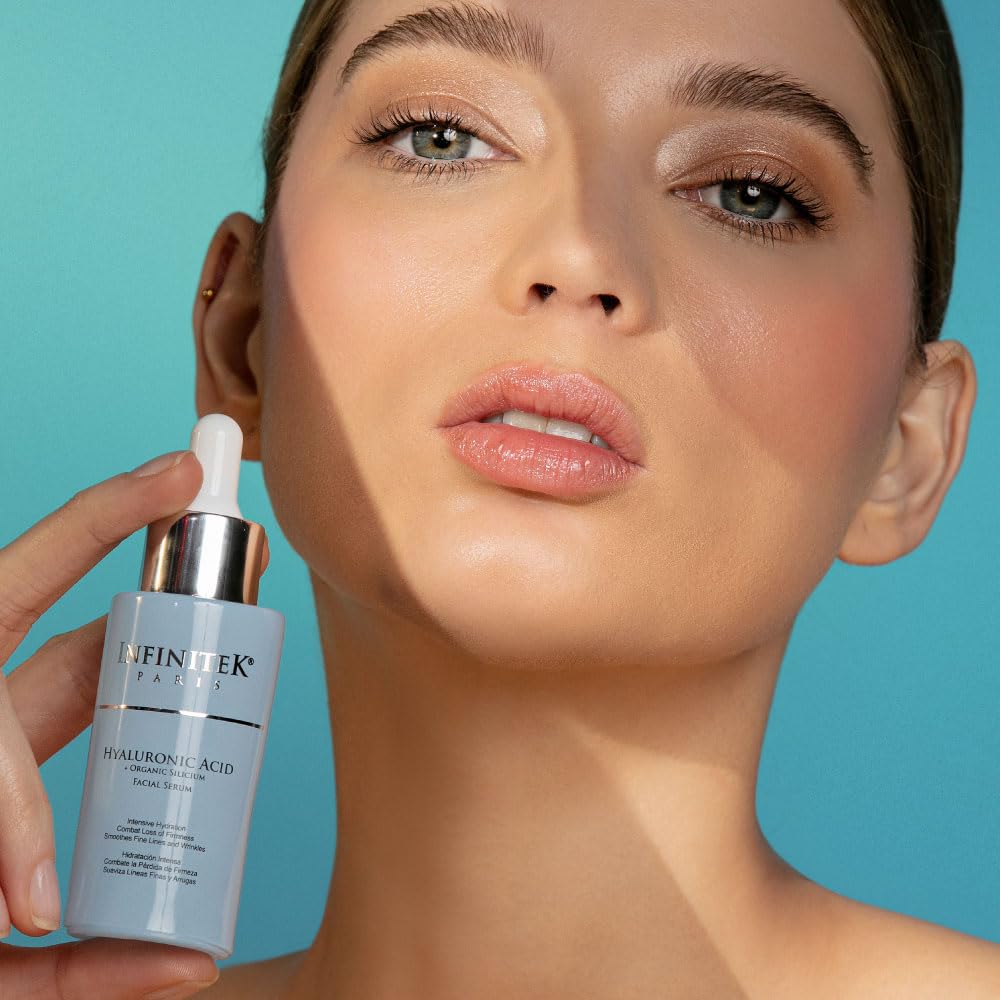 Infinitek Paris Hyaluronic Serum dropper in action demonstrates easy, even application.