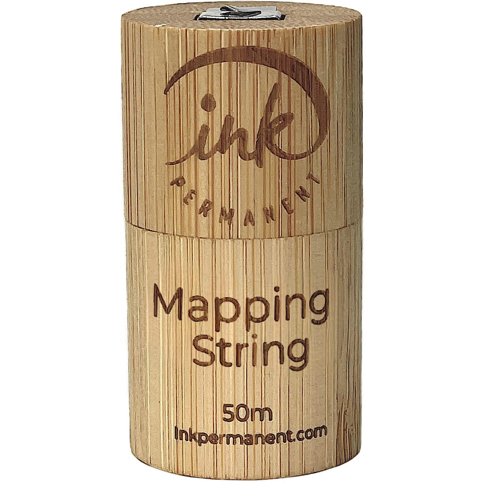 Ink Permanent white bamboo mapping string in a bamboo case for precise brow mapping