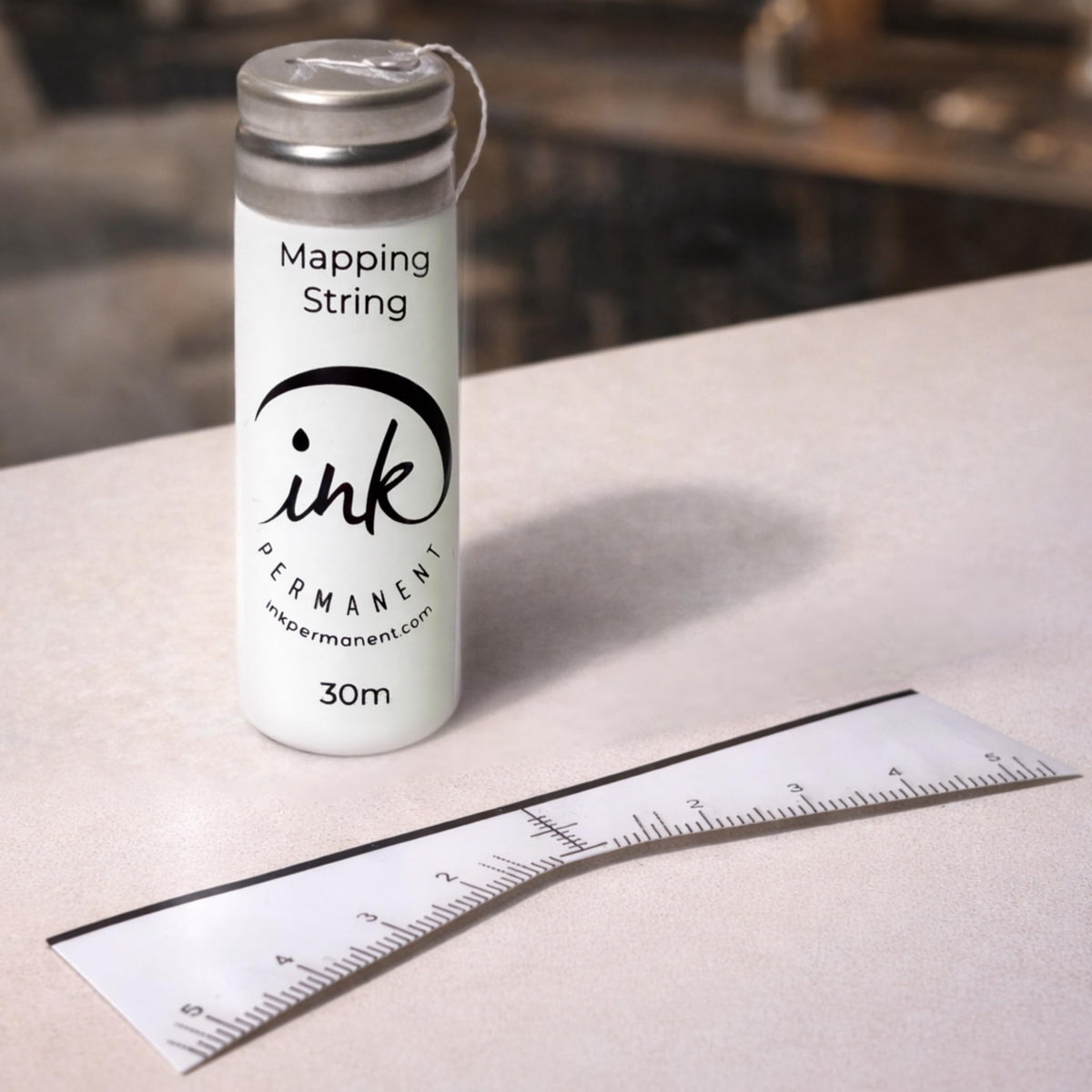 Ink Permanent white mapping pens; precise reference points for crisp brow outlines