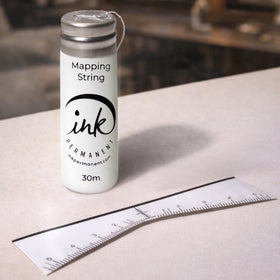 Ink Permanent white mapping pens; precise reference points for crisp brow outlines