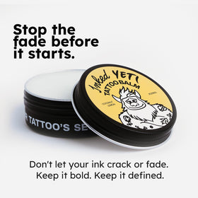 Hands applying Inked Yeti balm for quick-absorption and non-greasy hydration