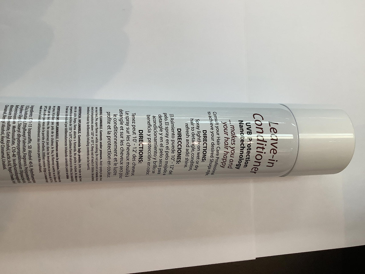 Inkursive Shuga Leave-In applied to damp hair for smoother combing.