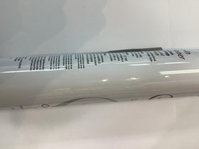 Packaging of Inkursive Shuga Spray Leave-In on a bathroom counter.