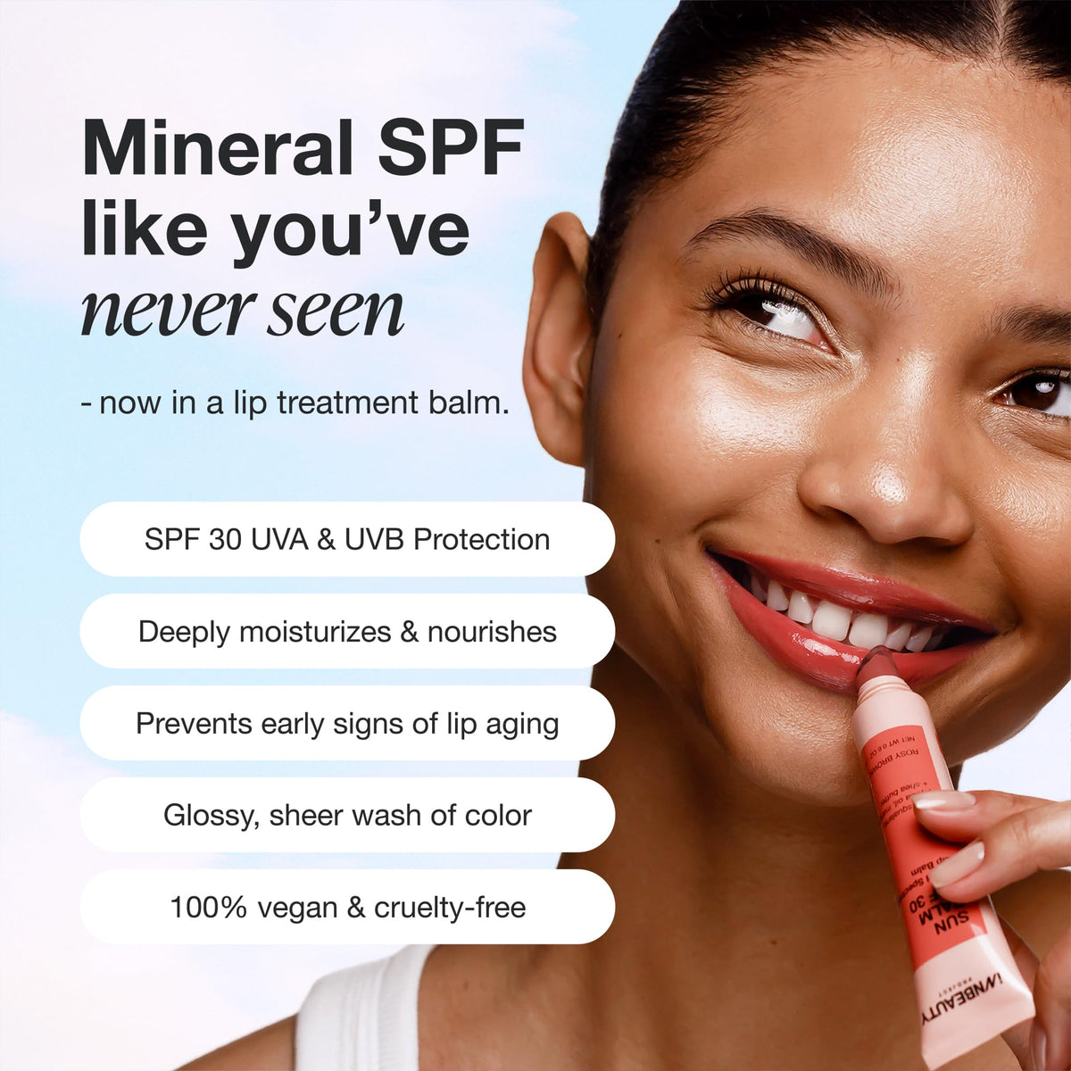 Close-up of lips wearing Innbeauty Project Sun Balm pink tint.