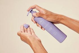 INNERSENSE Purple-toned duo on bathroom shelf suggesting a salon-inspired routine.