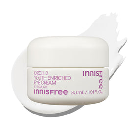 Innisfree Orchid Youth-Enriched Eye Cream bottle on vanity for brightening hydration.