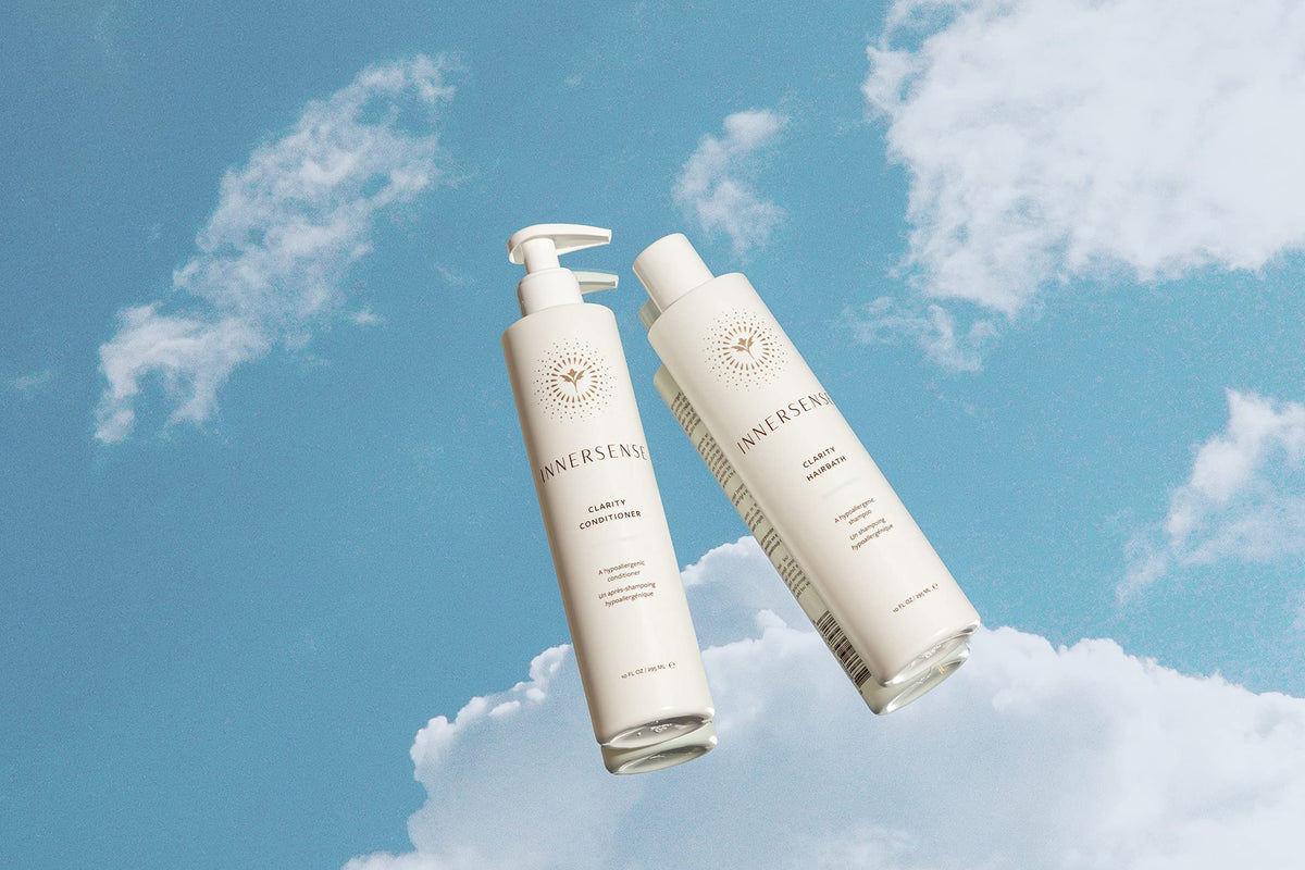 INNERSENSE hairbath being poured to show gentle cleansing action for sensitive skin.