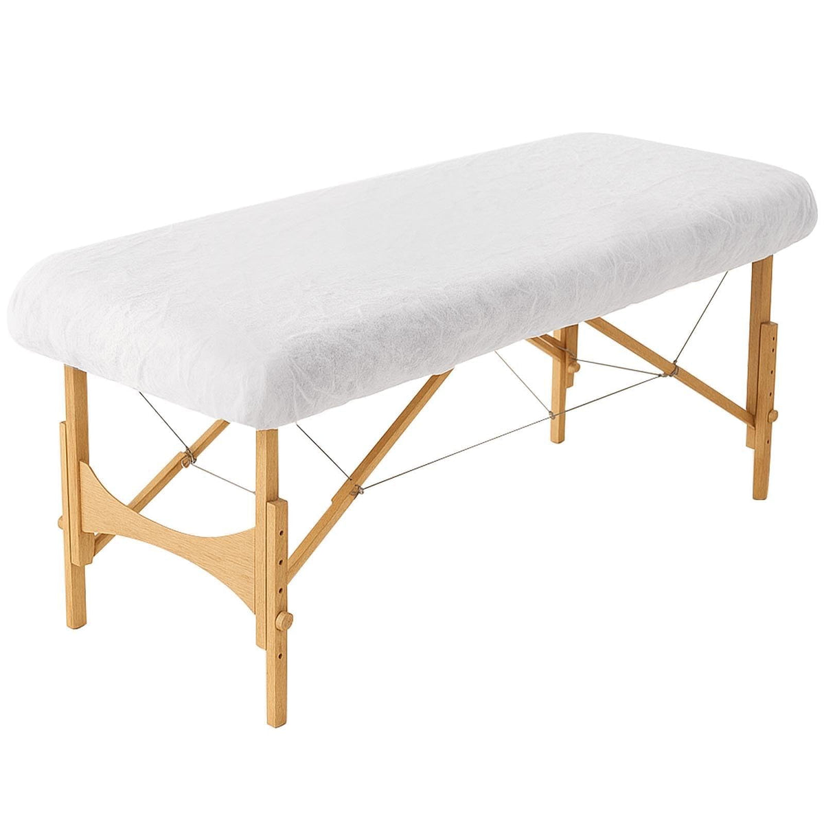 INNOVIO disposable sheets 82x35 white with elastic edge for secure, hygienic spa treatments.