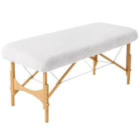 INNOVIO disposable sheets 82x35 white with elastic edge for secure, hygienic spa treatments.