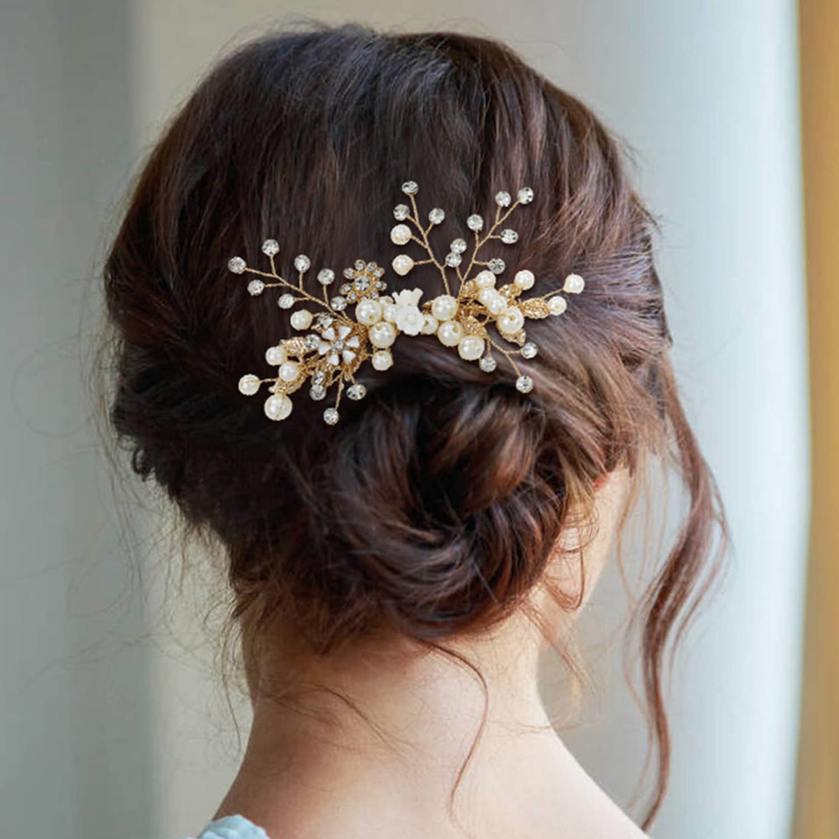 inSowni gold twist rhinestone pins provide secure grip for timeless wedding hair.