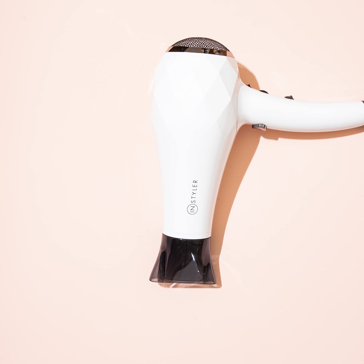 InStyler Turbo Ionic Dryer concentrator attachment concentrates heat for precise styling.
