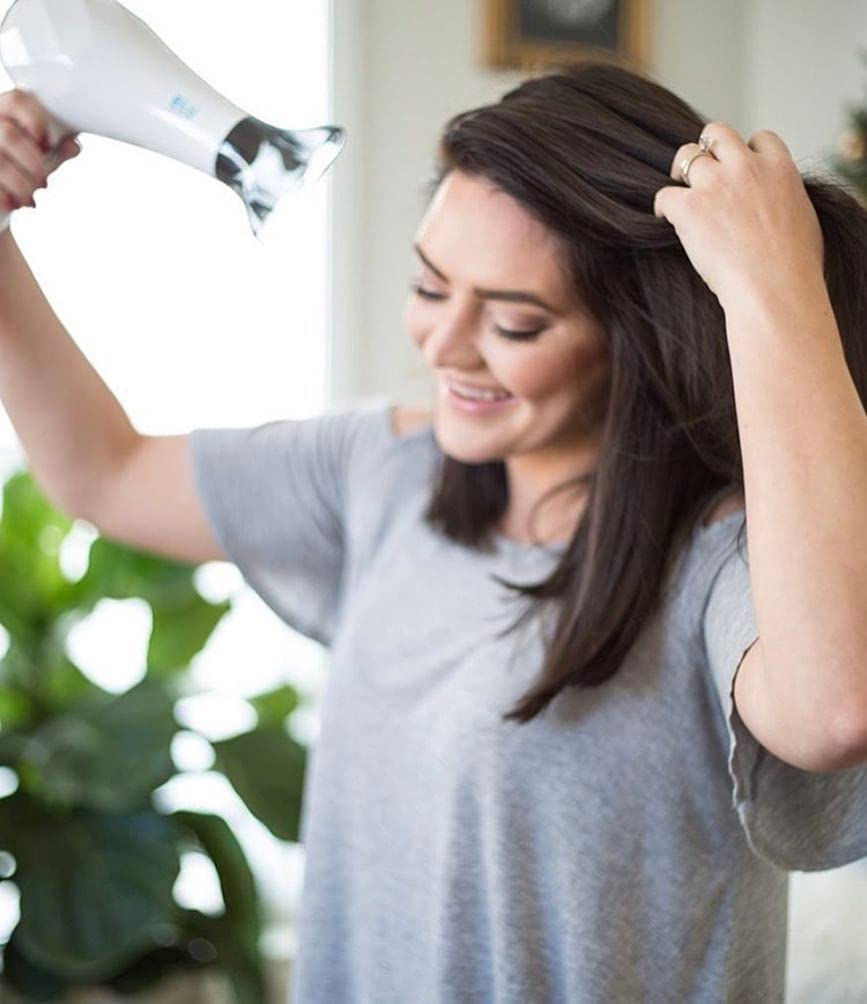 InStyler Turbo Ionic Dryer infinity dial demonstrates customizable airflow and ion settings.