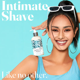 IntiMD Coochy Plus Coco Allure bottle with pump for easy dispensing.