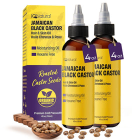 IQ Natural Jamaican Black Castor Oil bottle close-up for hair growth and skin conditioning.