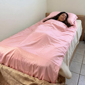Irenare Self Tan Sleep Sack pink portable for bed or travel, easy to pack.