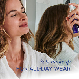 iS CLINICAL Copper Firming Mist atomizer in action for hydration.