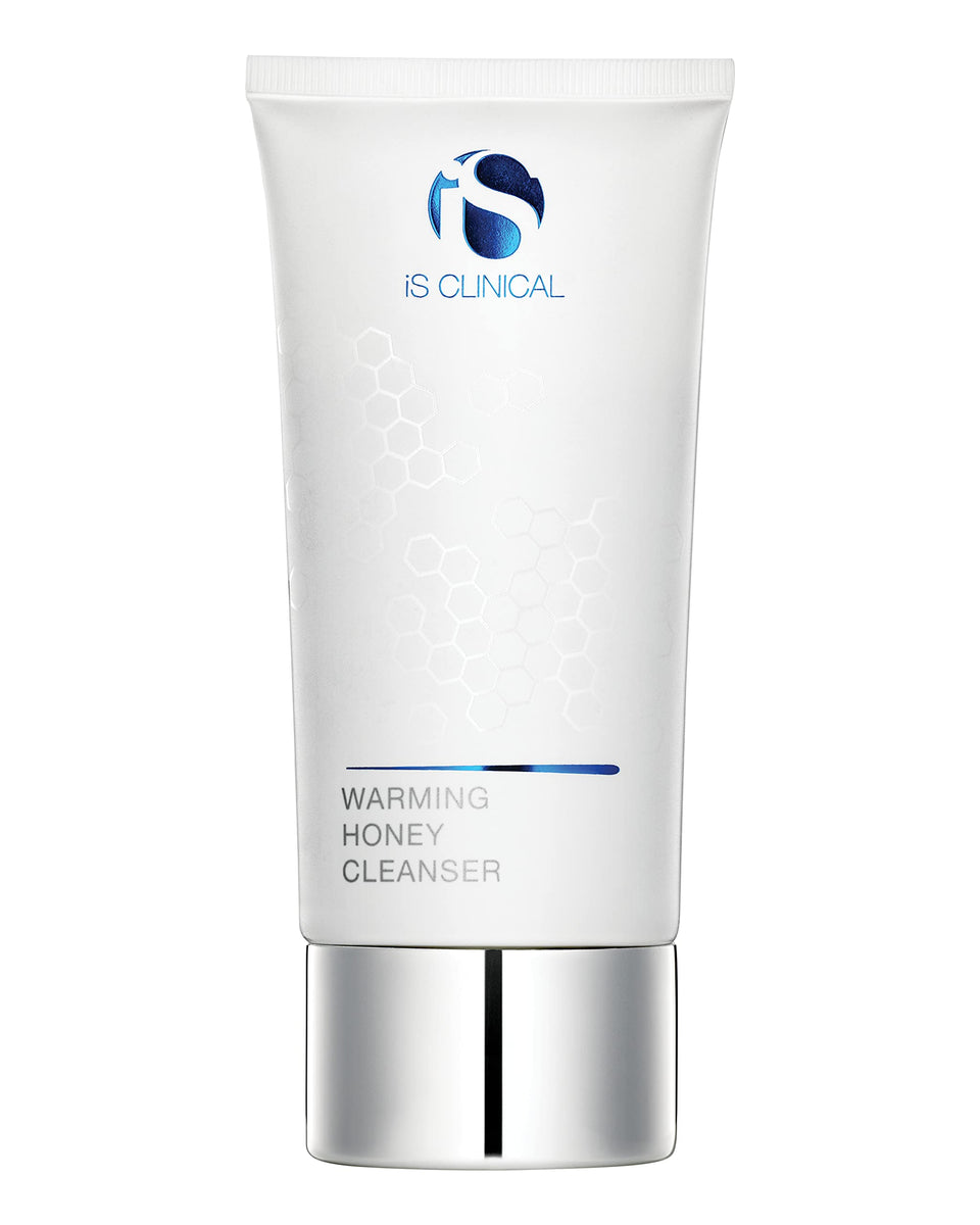 iS CLINICAL Warming Honey Cleanser bottle closeup emphasizing luxurious formula for hydration