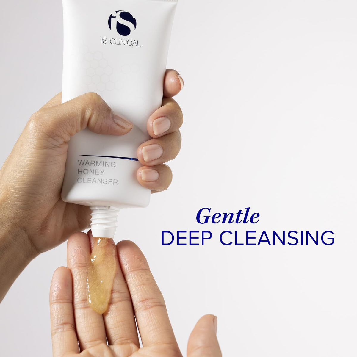 iS CLINICAL Warming Honey Cleanser foam application in hand illustrating gentle exfoliation