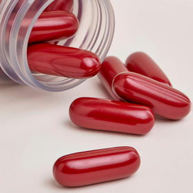 ISDIN Lambdapil capsules closeup highlighting plant-based formula for nourishing hair from within