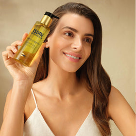ISDIN Isdinceutics Essential Cleansing Oil texture emulsion shows oil to milk transformation