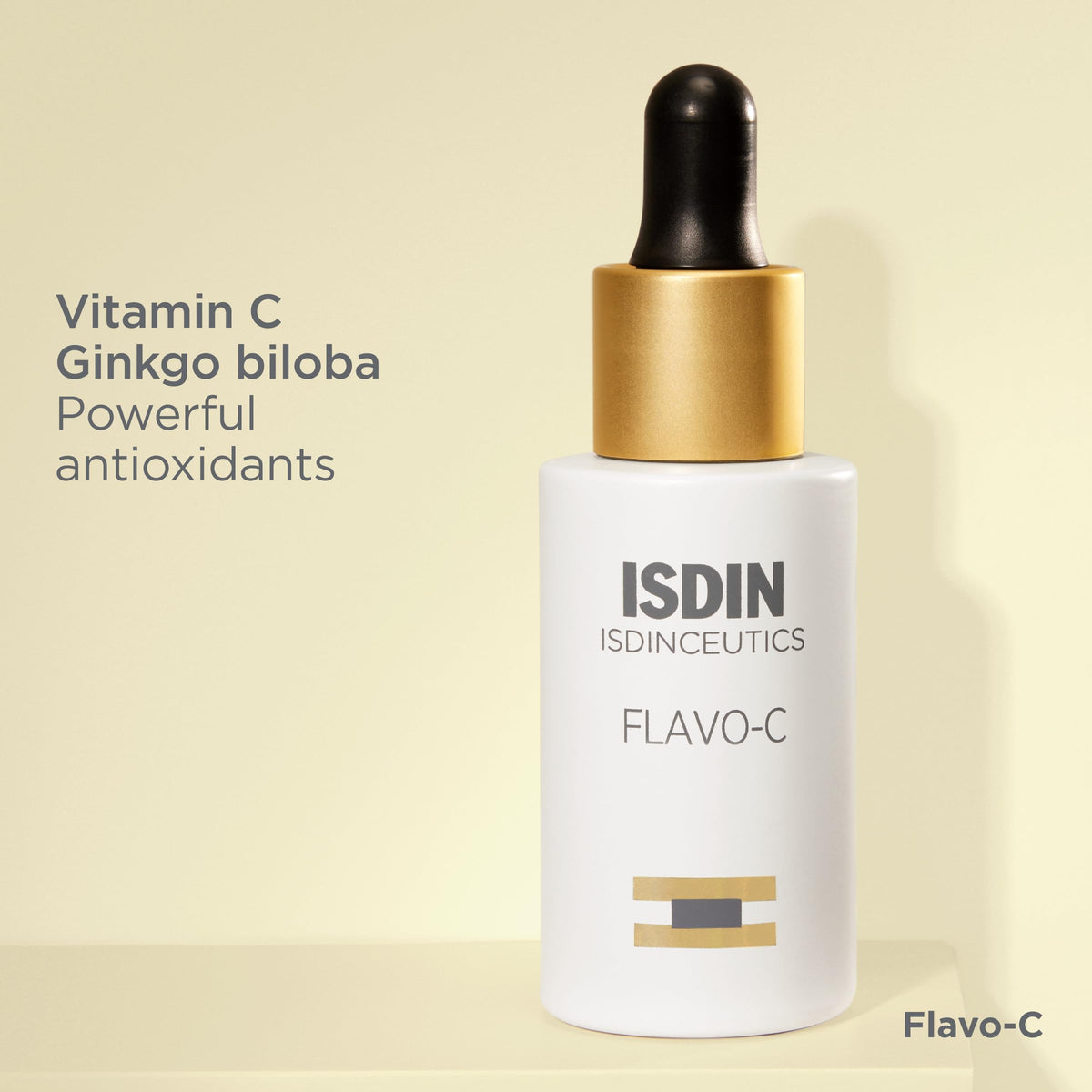 ISDIN Flavo-C serum application on the face; smooths and revitalizes skin.
