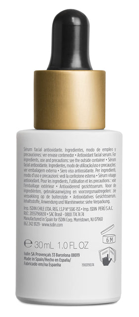 ISDIN Flavo-C serum on sun-kissed skin; adds healthy glow.