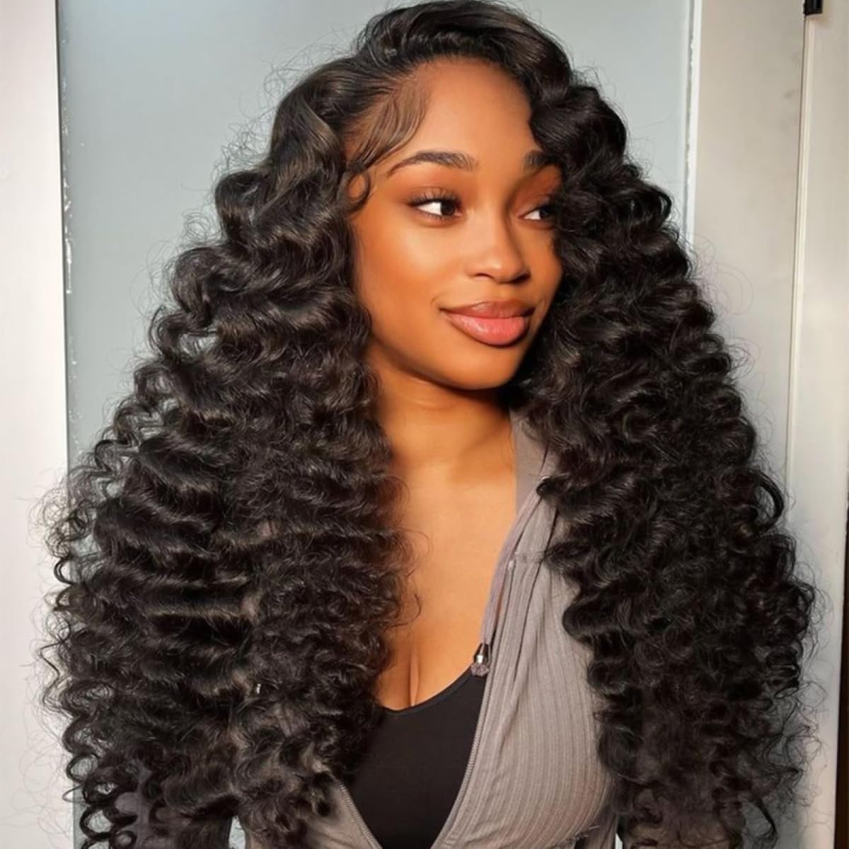 ISEE Half Wig with loose deep wave cap for easy, natural-looking wear.