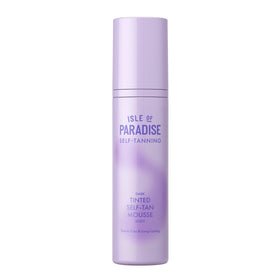 Isle of Paradise tinted mousse applying for an even dark bronze finish.