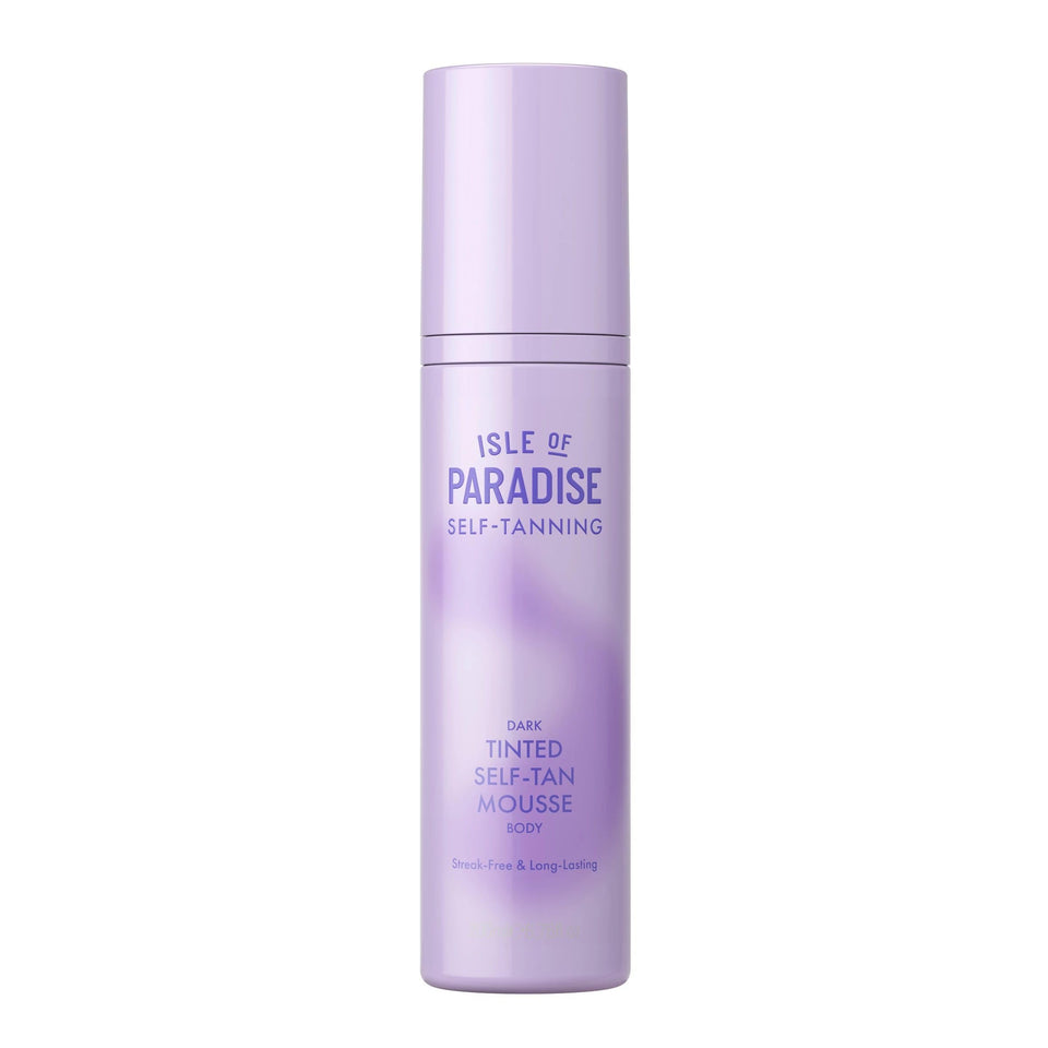 Isle of Paradise tinted mousse applying for an even dark bronze finish.