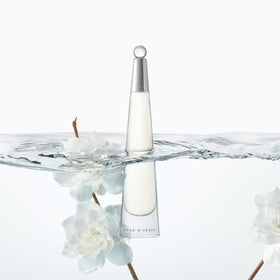 Issey Miyake L'Eau D'Issy lotion being applied for refreshed skin