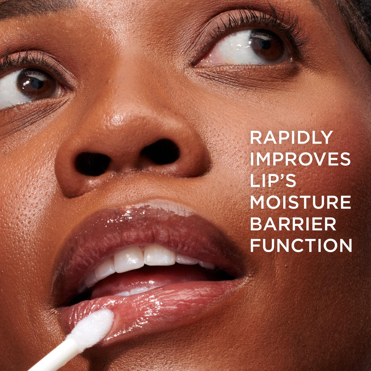 IT Cosmetics Confidence in a Serum Lip Gloss Self-Determined swatch on skin