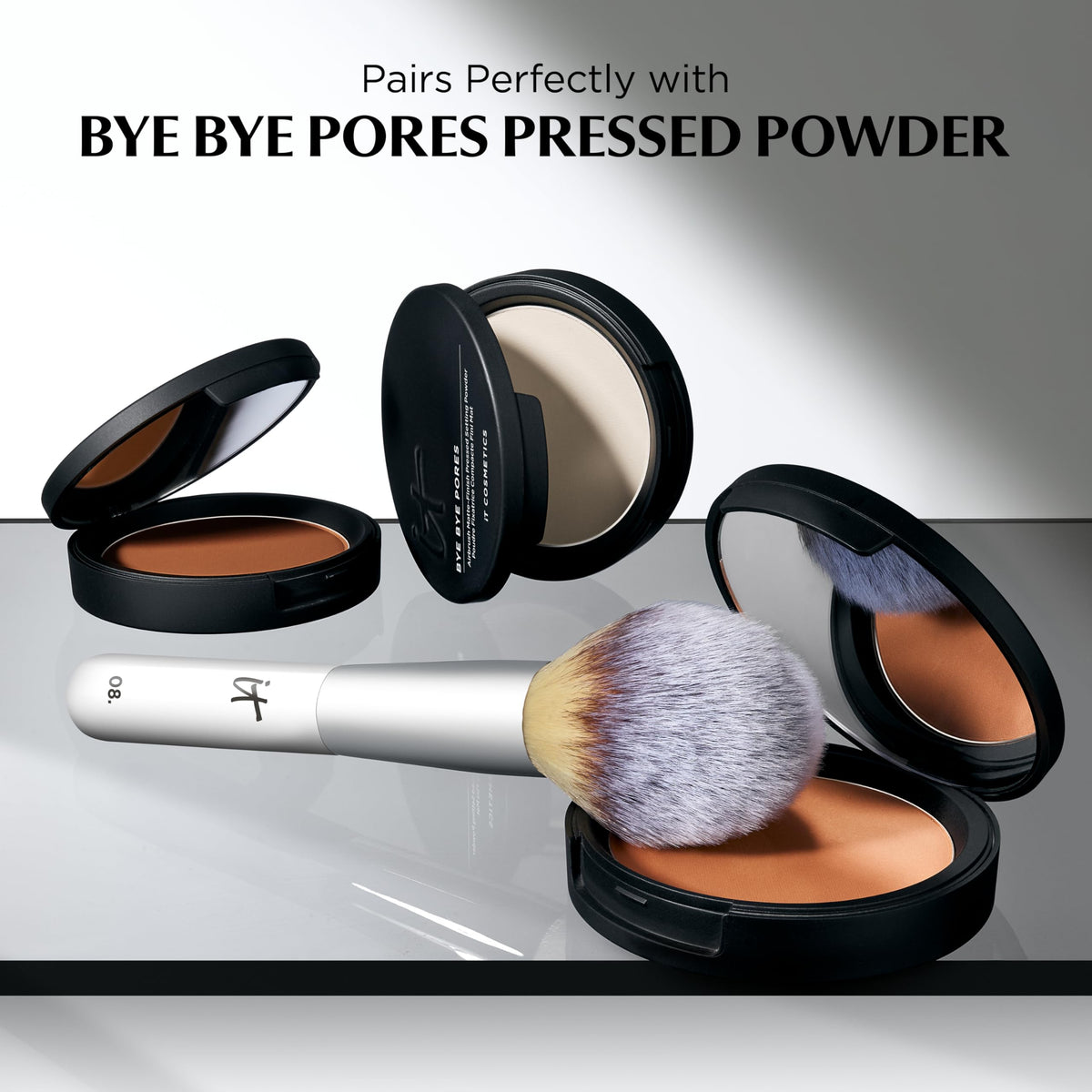 IT Cosmetics Wand Ball Brush #8 dusts powder with gentle sweeping for even décolleté coverage