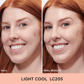 Close-up of IT Cosmetics soft-tip applicator for precise, mess-free concealing.