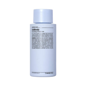 J Beverly Hills Blue Addbody Conditioner bottle highlighting volumizing formula.