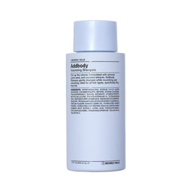 J Beverly Hills Addbody bottle close-up showing volumizing formula for fine hair.