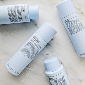 J Beverly Hills Addbody shampoo application in hand with creamy lather ready to nourish.