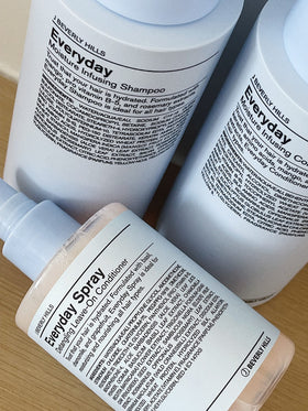 J Beverly Hills Blue Everyday bottle featuring aloe for nourished strands.