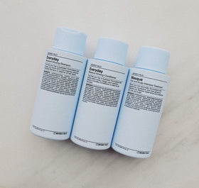 Rinse close-up showing clean strands after using J Beverly Hills shampoo.