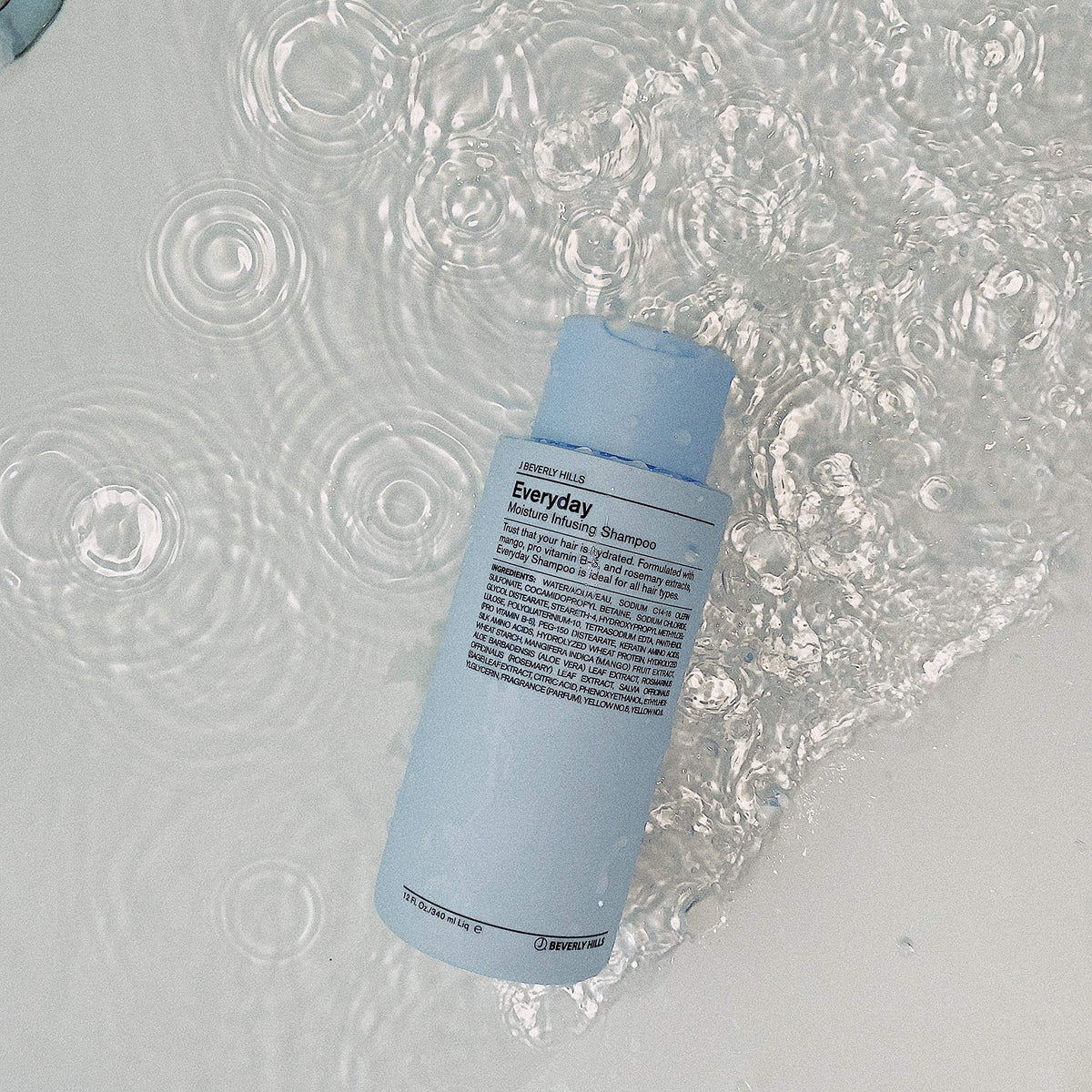 Close-up of lush lather from J Beverly Hills shampoo delivering hydration and scalp comfort.