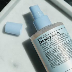 J Beverly Hills Blue Everyday spray nozzle shown for precise application.