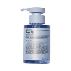 J Beverly Hills Blue Glaze Me Light bottle close-up highlights moisture boost.
