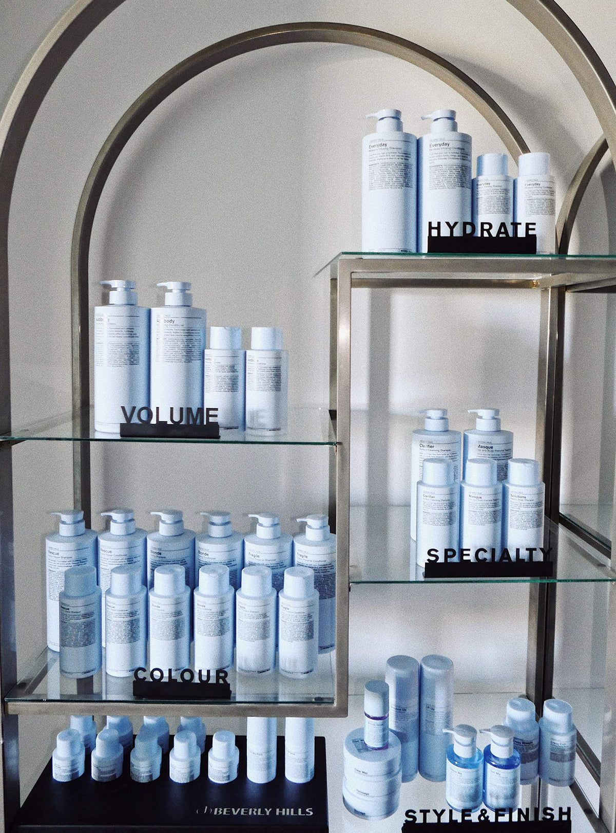 J Beverly Hills Blue Hair Mask bottle on towel-ready surface for at-home spa moment