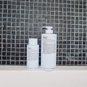 J Beverly Hills Blue Rescue Colour Repair Shampoo label close-up showing ingredients.