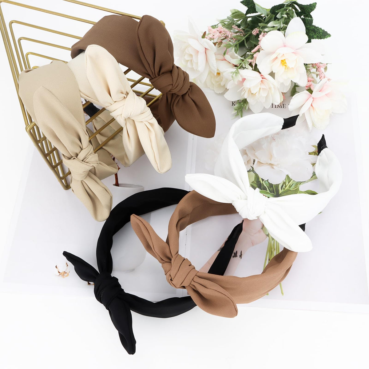Jaciya knotted bow headband brown pairs easily with outfits and stays secure