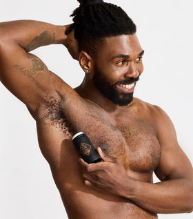 Close-up view of a man using the Black Reserve routine.