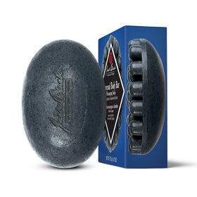Jack Black Charcoal Body Bar with raised nubs massaging skin for tension relief