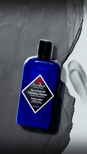 Jack Black Charcoal Body Buff packaging highlights premium formula and easy use.