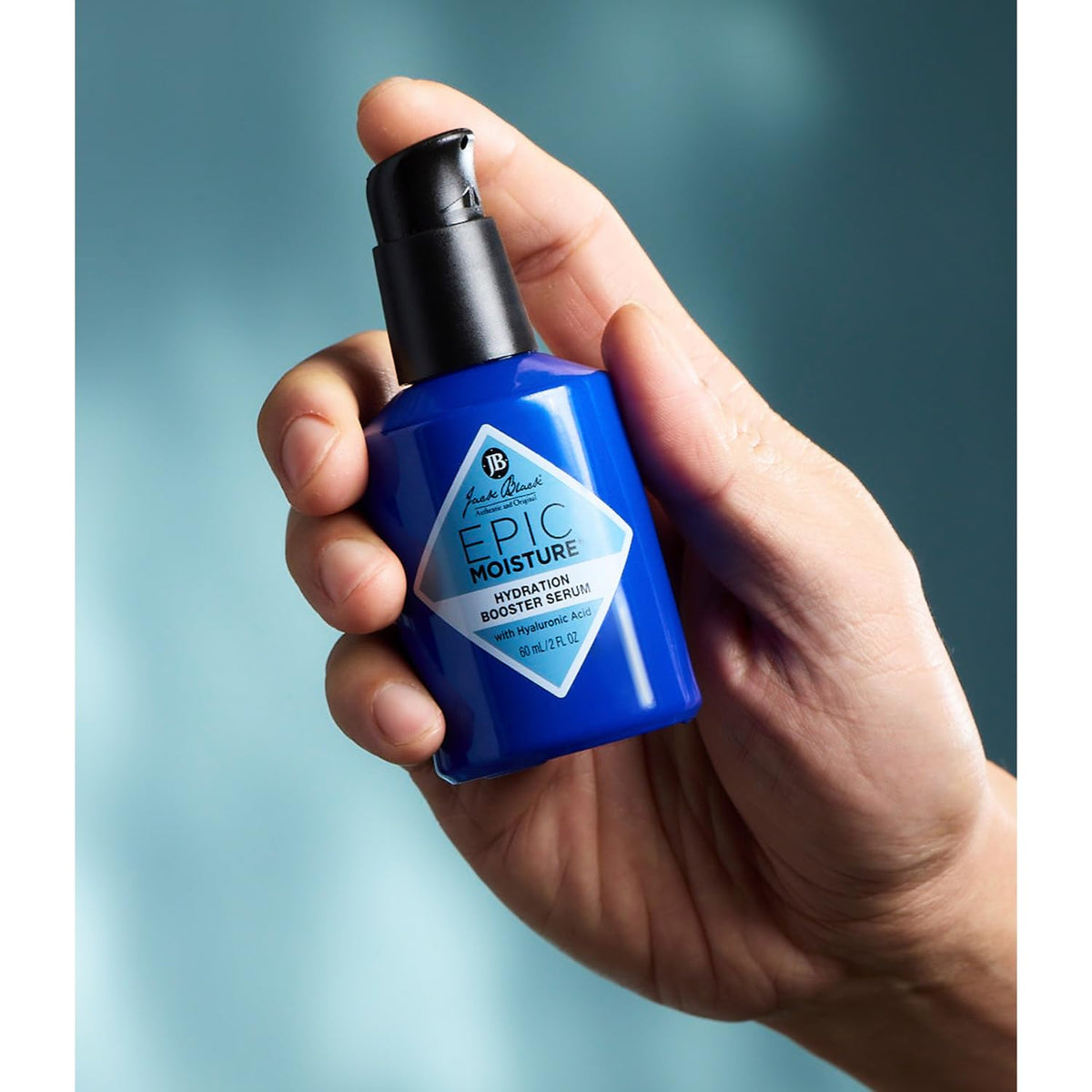 Dispense action shown for easy application and quick hydration with Jack Black serum.