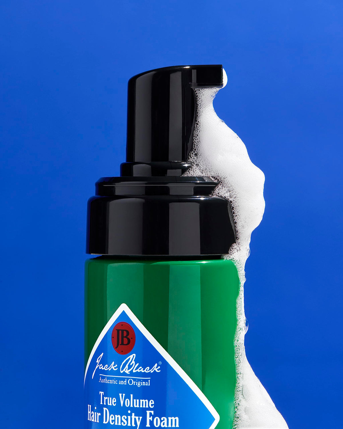 Dispensing pump on Jack Black True Volume Hair Density Foam for controlled application